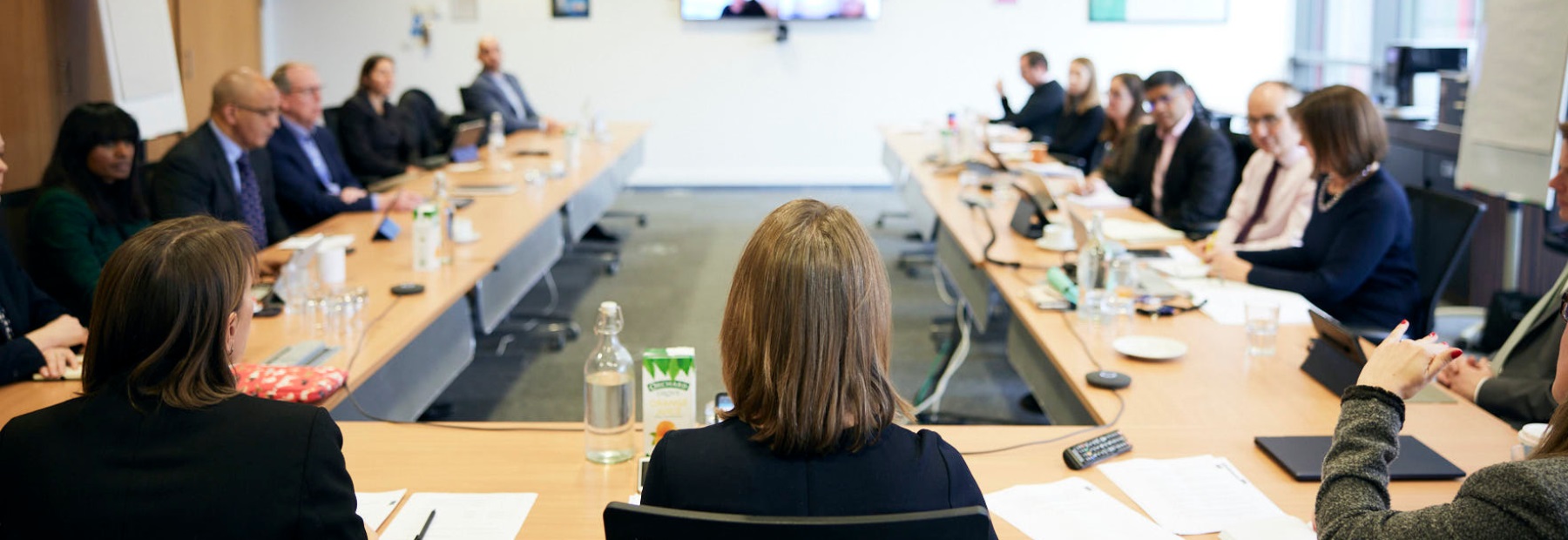 Board and Exco members sat at a roundtable