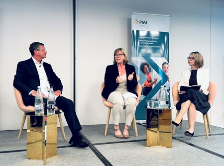 Michelle Ostermann, PPF CEO, and Kate Jones, PPF Chair, speaking to Ruston Smith at the PMI conference