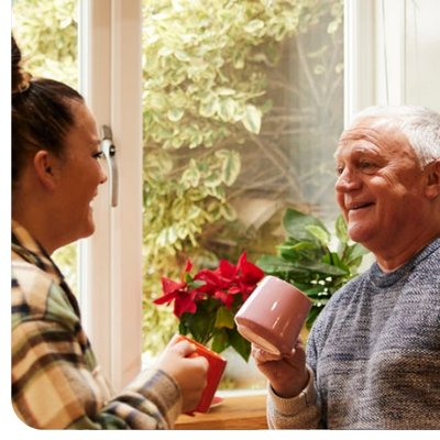 Older man talking to his daughter
