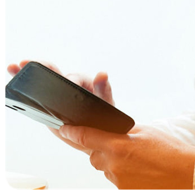 Person typing on their phone