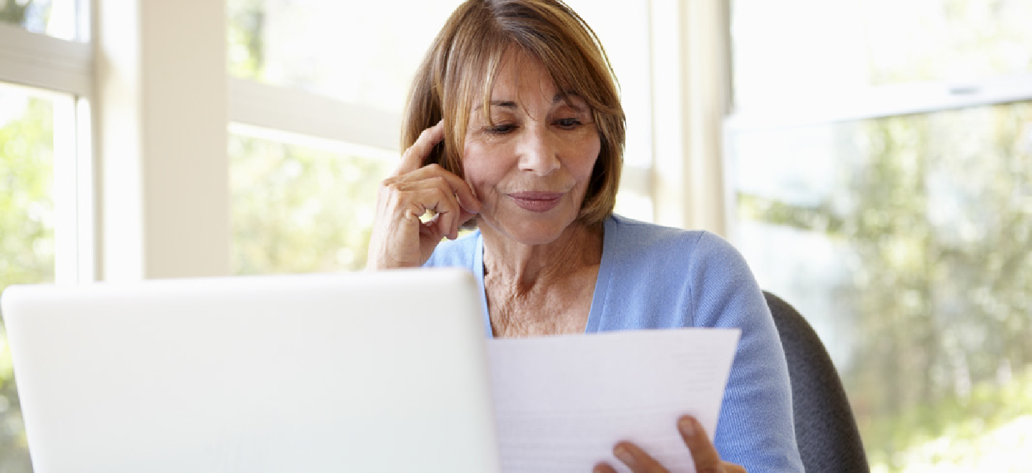 A lady sitting at a laptop